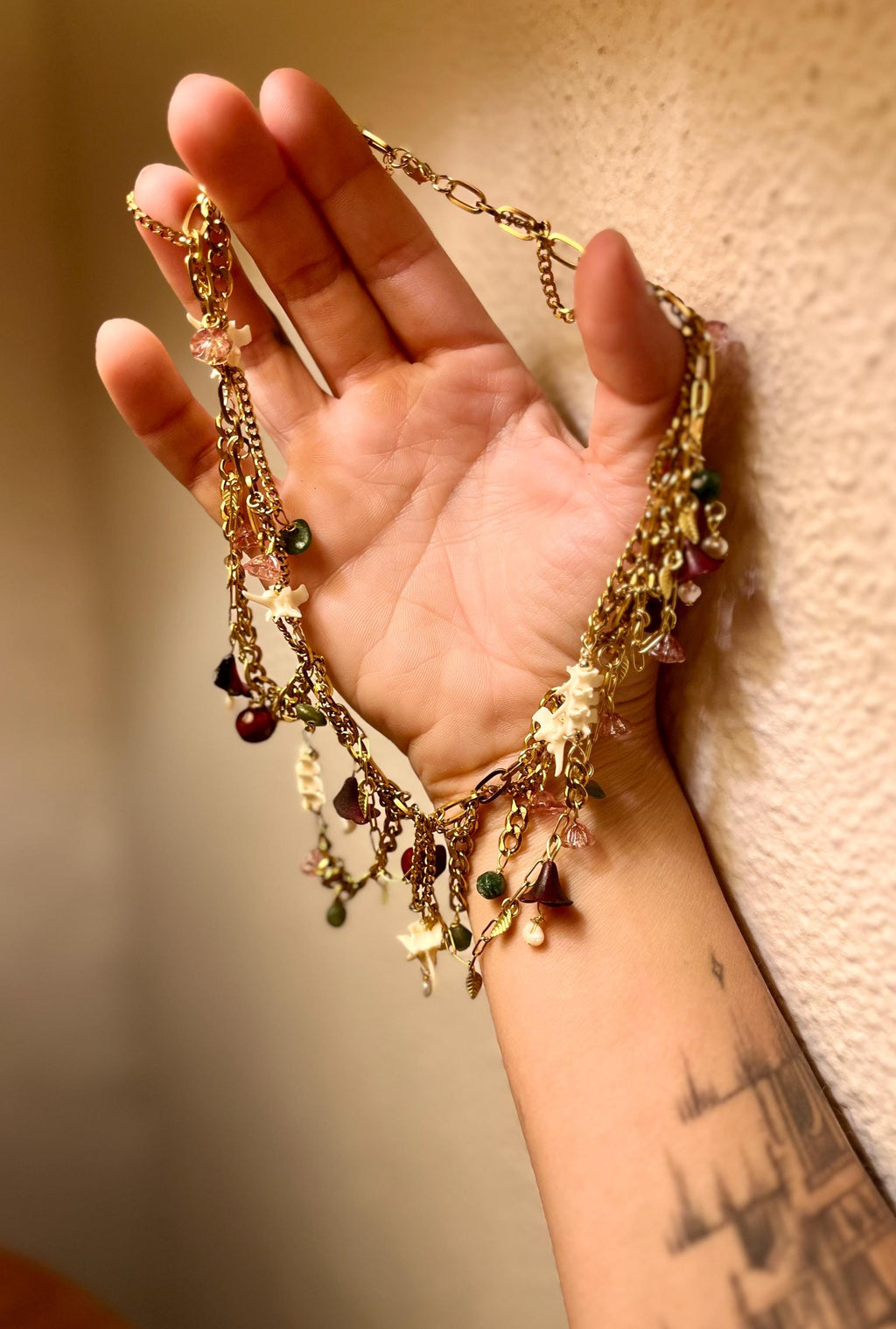 Garden of Eden Necklace – Jade, Tourmaline, Pearl, Rattlesnake Bone, Opalite, Pomegranate Charms – Draped Gold Chain – 15–17”