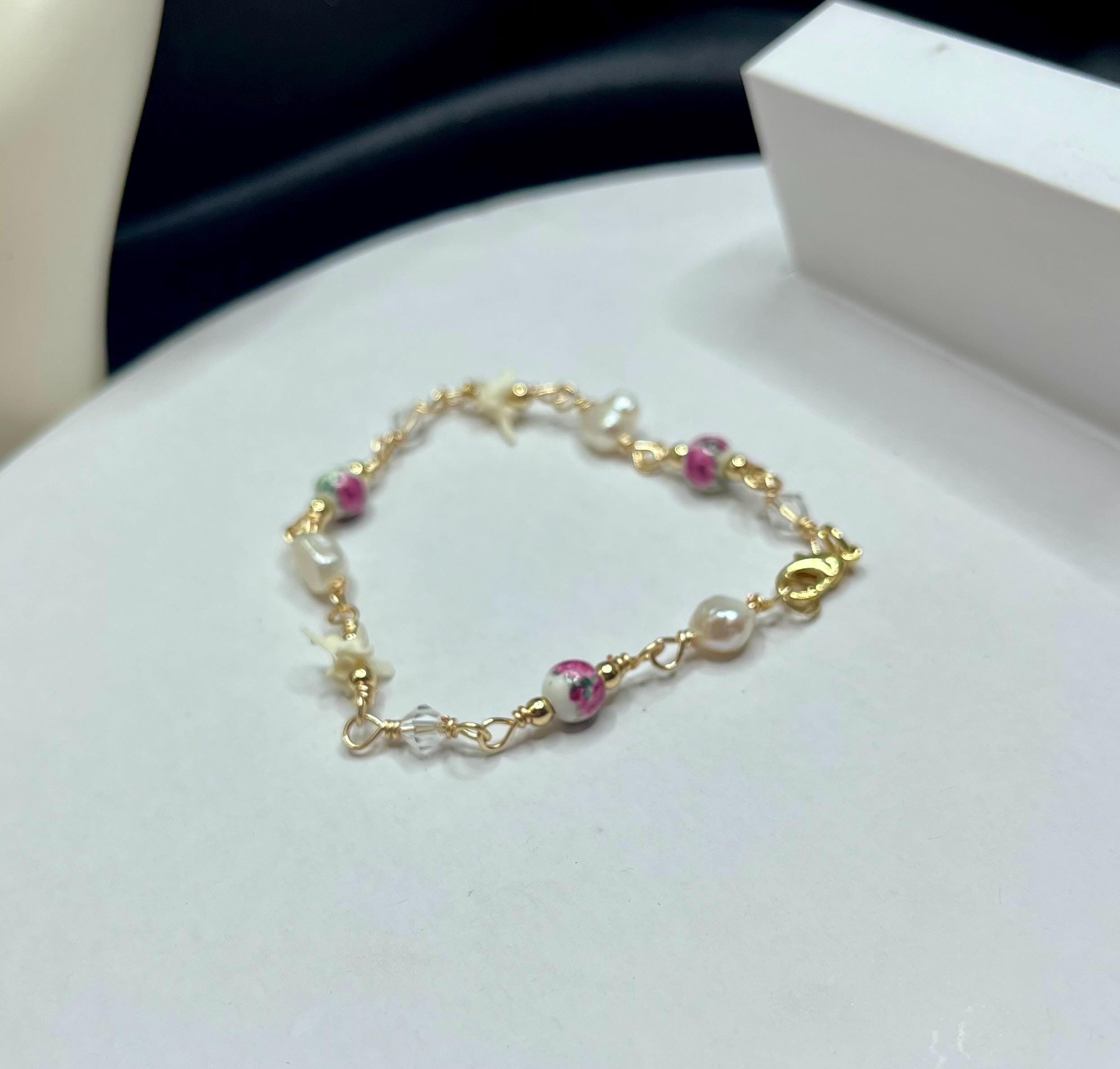 Pink Floral Ceramic, Freshwater Pearl, Rattlesnake Vertebrae & Crystal Bracelet – 18k Gold-Plated