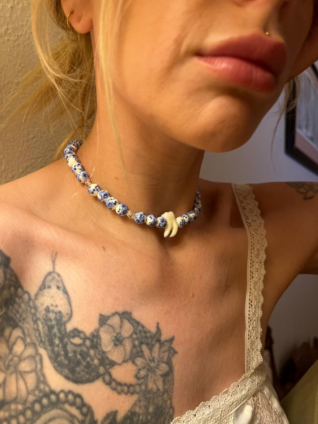 Human Tooth Necklace with Blue and White Floral Ceramic Beads and Crystal Accents, Stainless Steel, 14–16”
