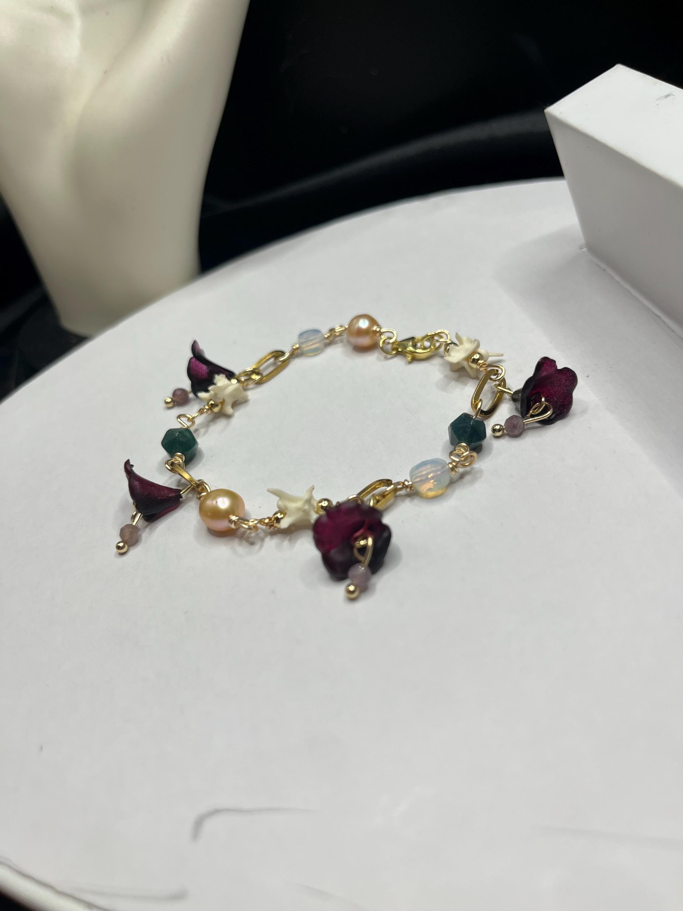 Garden of Eden Charm Bracelet – Pearl, Rattlesnake Vertebrae, Jade, Opalite & Acrylic Flowers