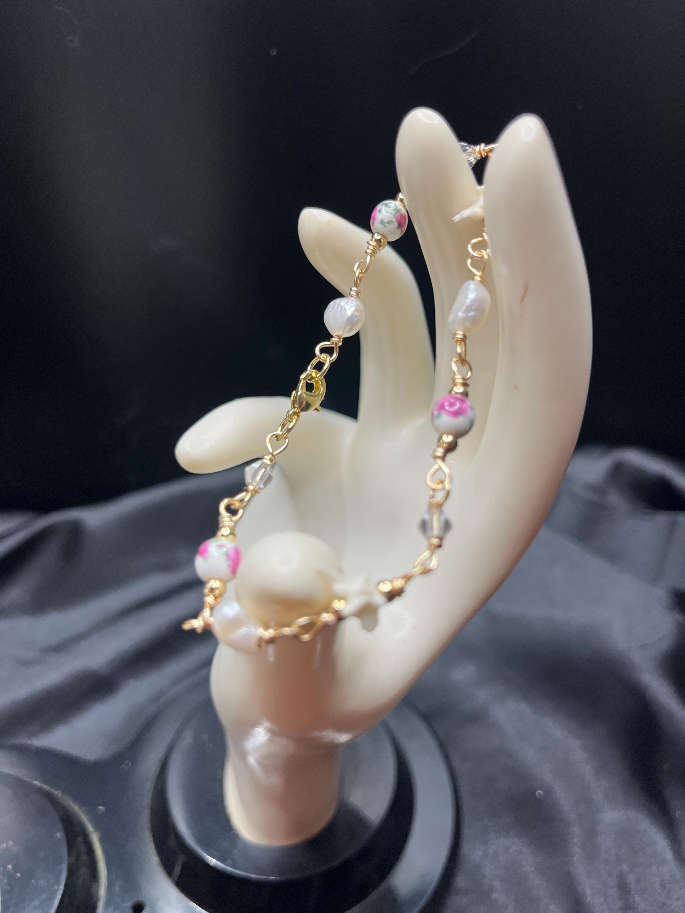 Pink Floral Ceramic, Freshwater Pearl, Rattlesnake Vertebrae & Crystal Bracelet – 18k Gold-Plated