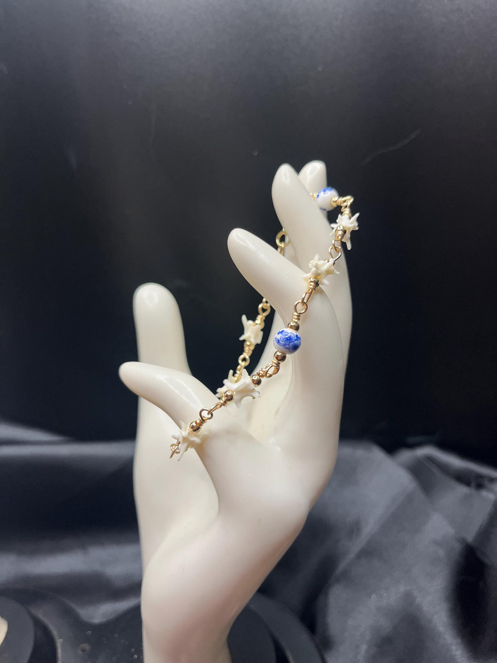 Blue Floral Ceramic Bead & Rattlesnake Vertebrae Bracelet