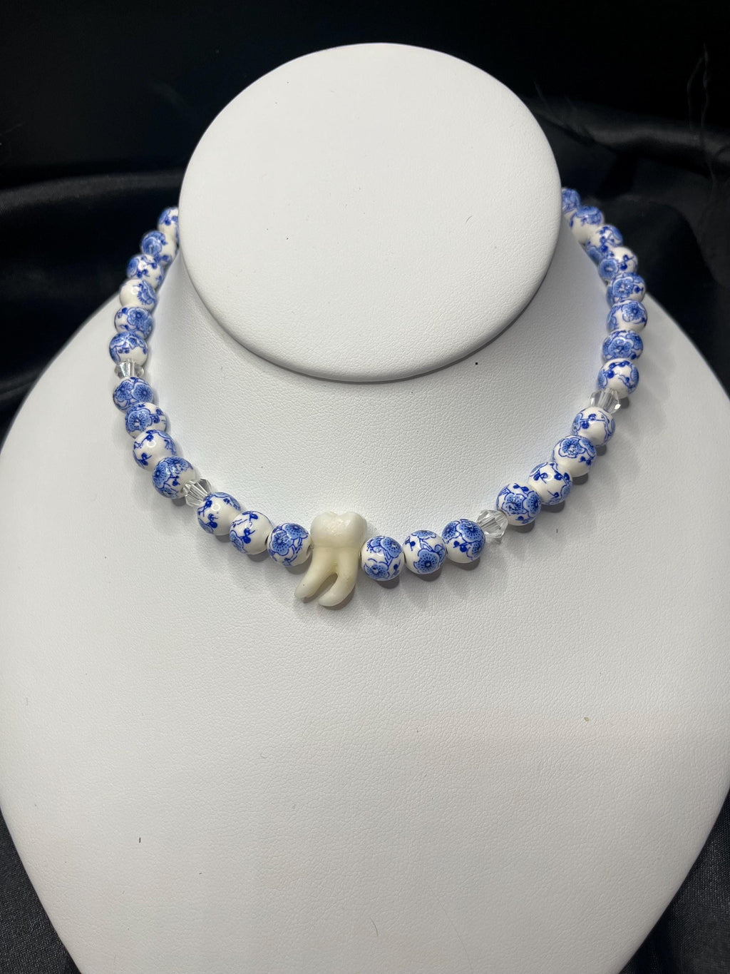 Human Tooth Necklace with Blue and White Floral Ceramic Beads and Crystal Accents, Stainless Steel, 14–16”