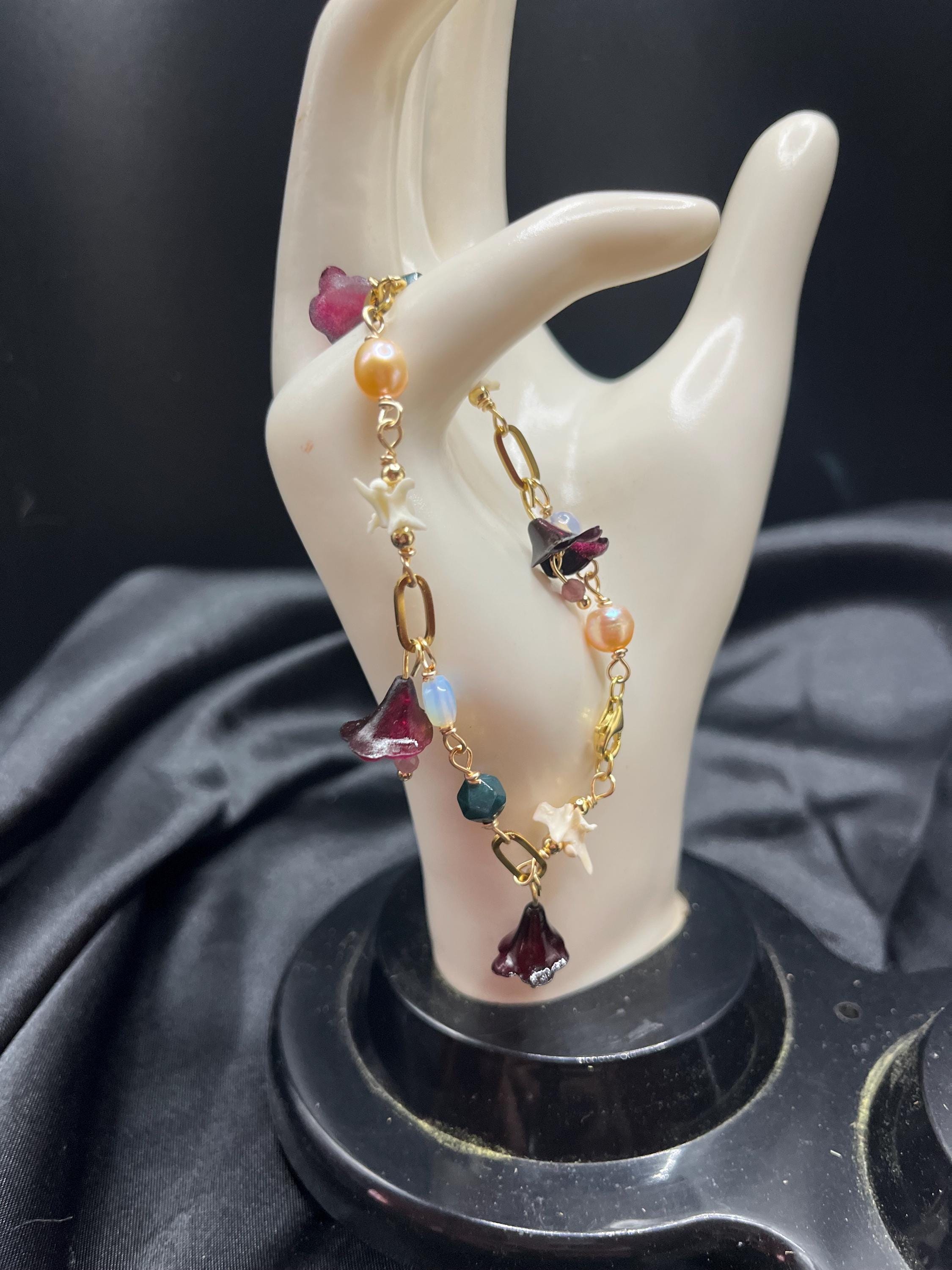 Garden of Eden Charm Bracelet – Pearl, Rattlesnake Vertebrae, Jade, Opalite & Acrylic Flowers