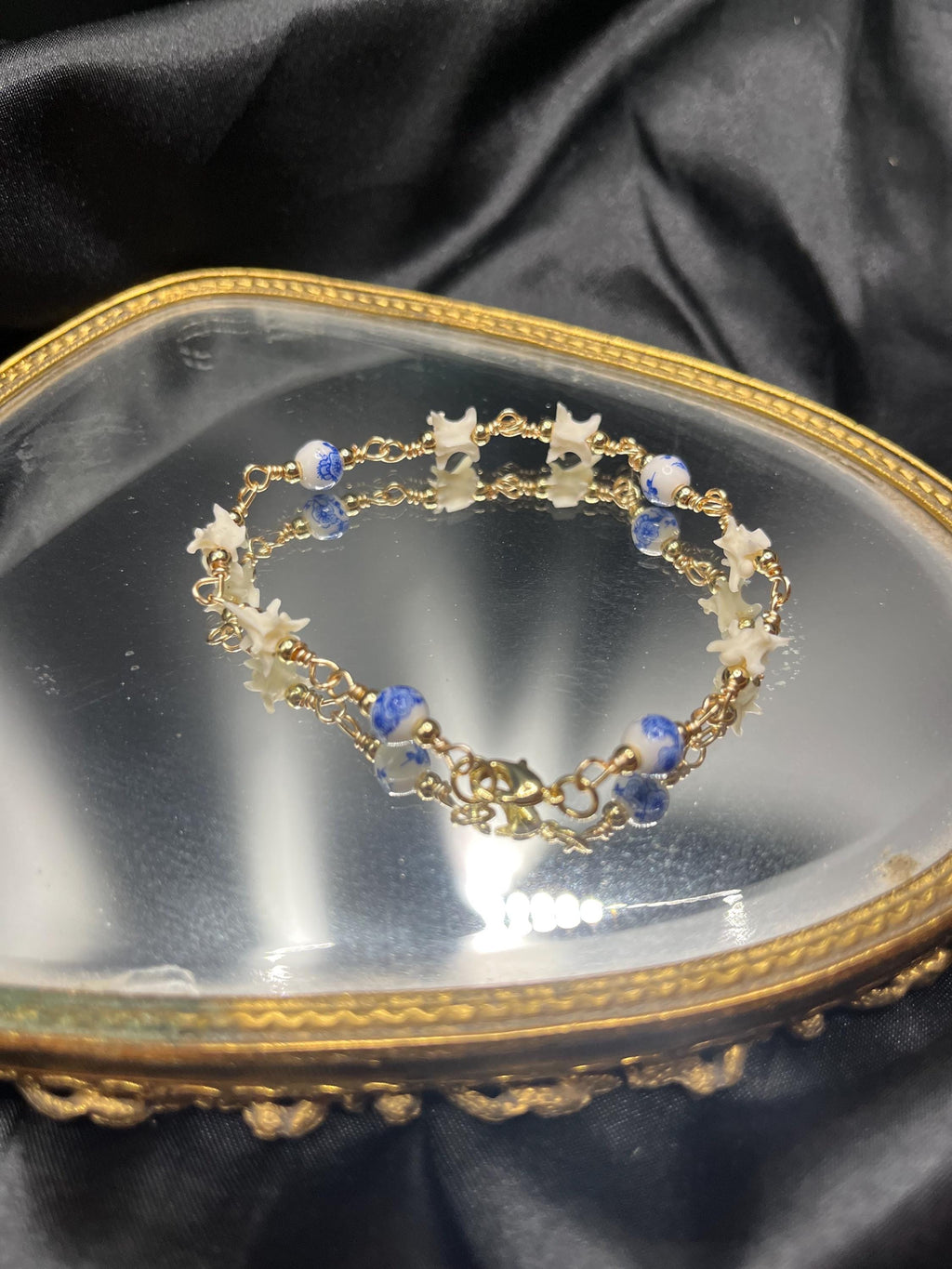 Blue Floral Ceramic Bead & Rattlesnake Vertebrae Bracelet