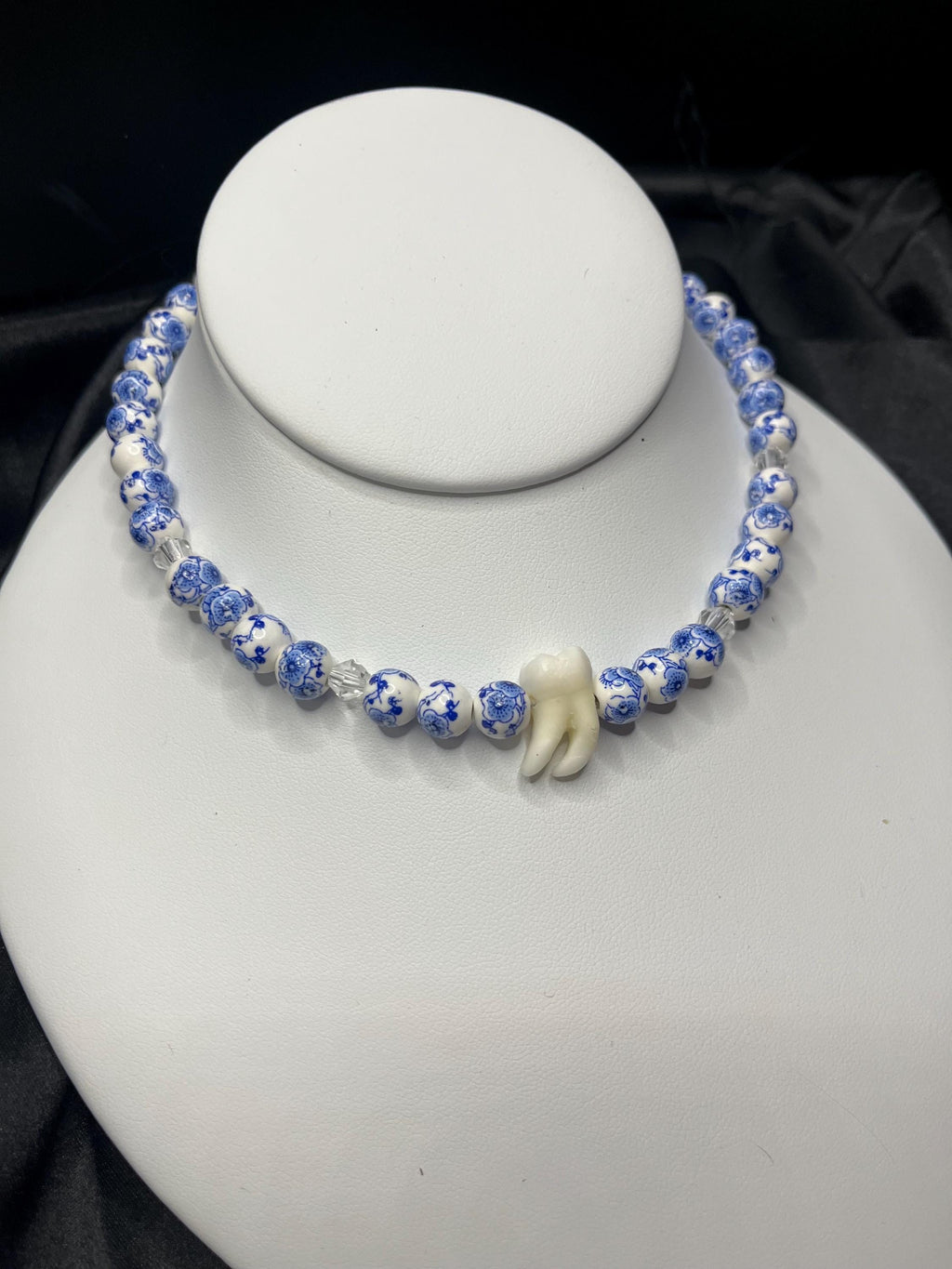 Human Tooth Necklace with Blue and White Floral Ceramic Beads and Crystal Accents, Stainless Steel, 14–16”