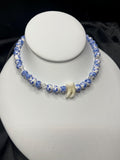Human Tooth Necklace with Blue and White Floral Ceramic Beads and Crystal Accents, Stainless Steel, 14–16”